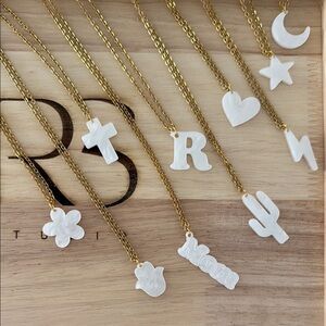 Gold Necklace with White Crescent Pendant